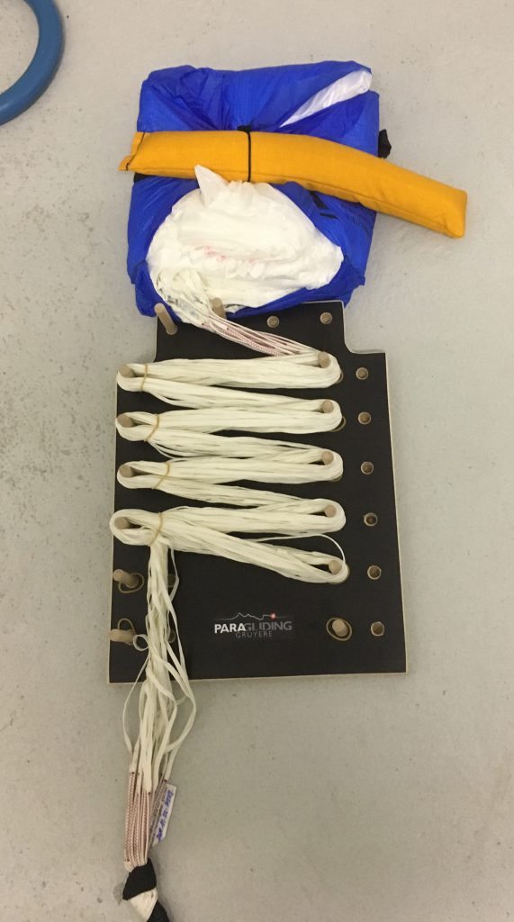 Folding emergency parachute