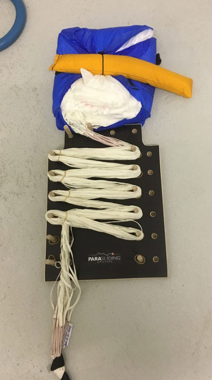 Folding emergency parachute